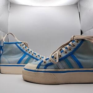 Adidas Blue and White Athletic Shoes with Vintage Appeal